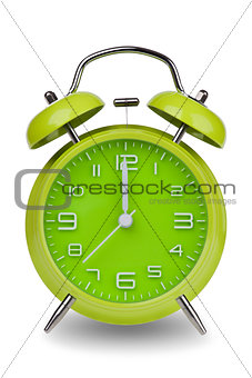 Green alarm clock with hands at 12 am or pm