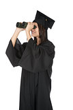 Beautiful Caucasian woman wearing in a black graduation gown