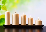 white candles on wood table