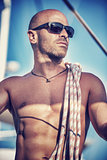 Handsome man on sailboat