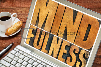 mindfulness word typography on laptop