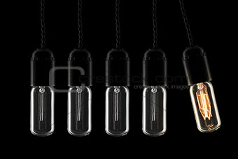 Lightbulbs swinging pendulum
