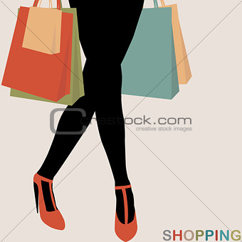 Shopping concept with woman silhouette carrying shopping bags