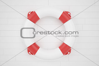 lifebuoy lying on a wooden surface