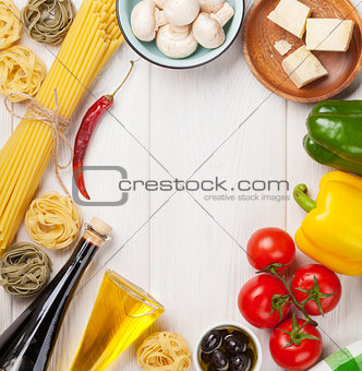 Italian food cooking ingredients. Pasta, tomatoes, peppes