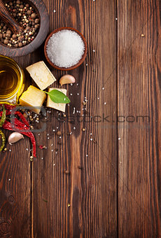 Various spices on wooden background