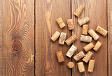Wine corks over rustic wooden table background