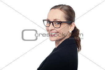 Side profile of a woman wearing spectacles