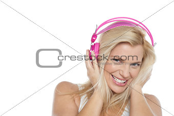 Woman enjoying music with headphones on