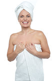 Caucasian woman wrapped in a towel