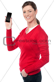 Lady showing her brand new cellphone
