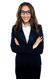 Bespectacled smiling businesswoman portrait isolated