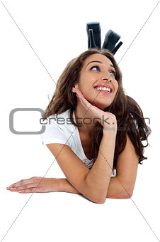 Relaxed woman on the floor looking upwards