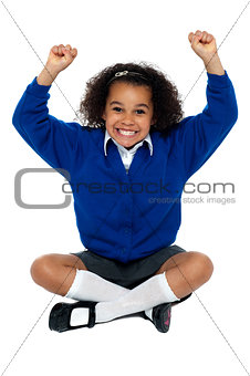 Primary school girl grinding her teeth in excitement