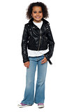 Charming young girl in bikers leather jacket