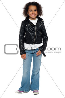 Charming young girl in bikers leather jacket
