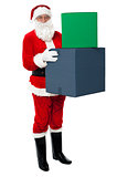 Photo of happy Santa Claus delivering gifts
