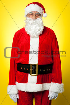 Isolated aged male dresses in Santa attire