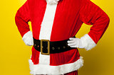 Cropped image of Santa resting his hands on waist