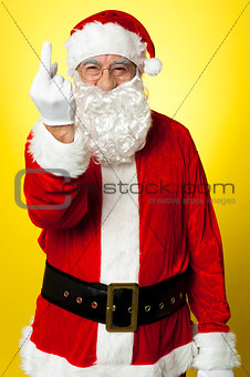Angry Santa showing middle finger