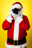 Smile please! Santa capturing a perfect frame