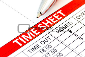 Compiled Time sheet with a pen