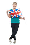 Cute blonde UK supporter striking stylish pose