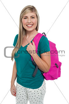 Teen posing with pink backpack