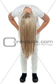 Girl with long hair bending down