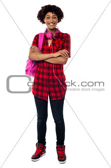 Stylish university student with folded arms