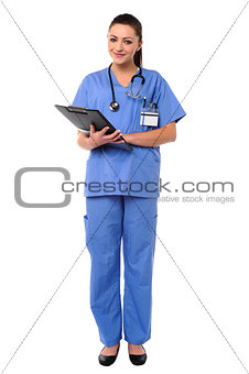 Smiling young female doctor at duty