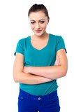 Attractive young woman with folded arms