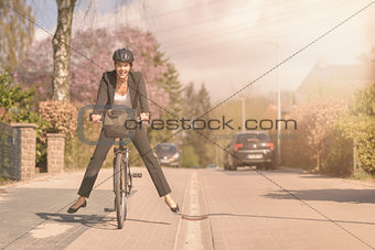 Stylish woman having fun riding to work