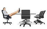 Businesslady sitting in chair with her crossed legs on table