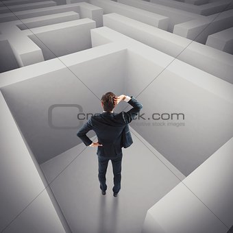 Businessman lost in a maze