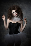 girl with gothic clown make-up 