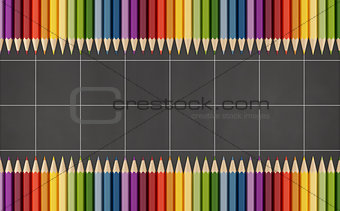 Blackboard  with colorful pencils
