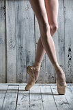 Young legs graceful ballerina.