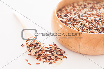 Organic Dry Multi Grain Rice in wooden bowl