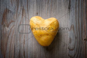 Heart shaped golden potato