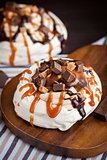 Caramel and chocolate Pavlova meringue cake