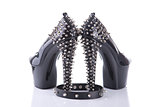 Black high heel shoes and choker with spikes 