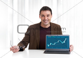 Man Analyzing Stock Market Graph