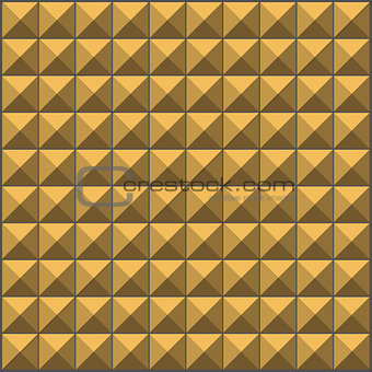 wall with yellow brown pyramid tiles pattern