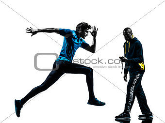 man runner sprinter with coach  stopwatch silhouette