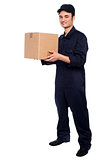 Young boy delivering parcel