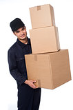 Young courier boy moving boxes