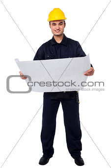 Male architect with construction plan