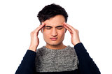 Young guy having headache