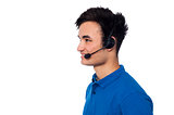 Young friendly guy wearing headset